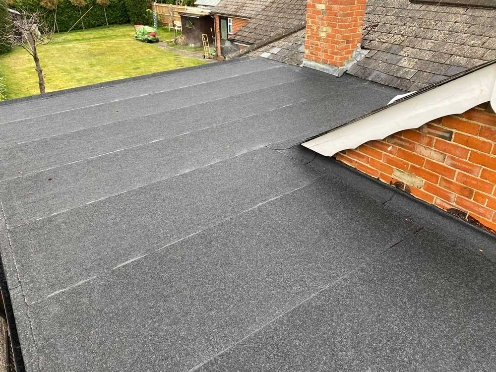 Avalon Roofing | Flat Roofs| Image showing felt flat roof work completed